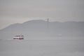 Ferry and Golden Gate Bridge in San Francisco, California, USA Royalty Free Stock Photo