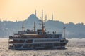 Ferry and Istanbul view. Suleymaniye Mosque on the background