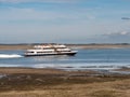 Ferry leaving Wittdun on Amrum island, North Frisia, Schleswig-Holstein, Germany Royalty Free Stock Photo