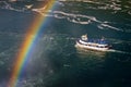 Ferry Maid of the Mist and rainbow in the Niagara River. Niagara Falls. Royalty Free Stock Photo