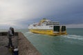 The ferry navigates along the pier in dieppe, normandy towards england Royalty Free Stock Photo