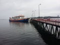 Ferry near the pier on loading, Chiloe Island Patagonia. Chile