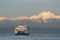 Ferry and Olympic Mountains in early morning sunlight Royalty Free Stock Photo