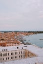 The ferry pier and mooring place for gondolas - San Marco-San Zaccaria in Venice, Italy. Aerial view from huge cathedral Royalty Free Stock Photo