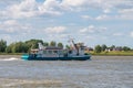 Ferry sailing on river Boven-Merwede from Woudrichem to Gorinchem, Netherlands