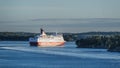 Ferry ship Amorella of Viking Line sails through the Stockholm Archipelago in Sweden at sunny autumn evening Royalty Free Stock Photo