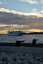 Ferry ship arriving at the Split harbor at sunset Royalty Free Stock Photo