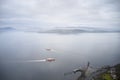 Ferry ship crossing on open vast ocean cruise journey aerial view from above during atmospheric weather sea island trip Scotland U