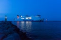 Ferry ship and lighthouses at Rostock-Warnemunde Royalty Free Stock Photo