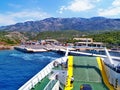 Ferry trajekt Jadrolinija leaving port of Stinica, Velebit national park in background, Croatia Royalty Free Stock Photo