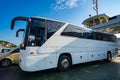 ferry transports bus and cars, passengers, across the bay, close view of autobus and deck