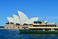 A ferry in the water with Sydney Opera House Royalty Free Stock Photo