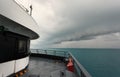 Ferryboat and Dramatic Storm Clouds.