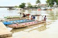 Ferrymen on river in Manado