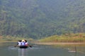 Ferrymen are taking tourists to visit the Trang An Eco-Tourism Complex, a complex beauty - landscapes called as an outdoor
