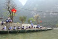 Ferrymen are waiting for tourists to visit the Trang An Eco-Tourism Complex, a complex beauty - landscapes called as an outdoor g