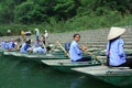 Ferrywomen are waiting for tourists visiting the Trang An Eco-Tourism Complex, which is a complex beauty - landscapes called as an