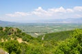 Fertile agricultural growing fields between mountains