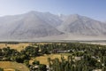 Fertile Wakhan Valley near Vrang in Tajikistan. The mountains in the background are the Hindu Kush in Afghanistan