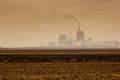 Fertilizer mill polluting the atmosphere with smoke and smog Royalty Free Stock Photo