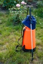 Fertilizer pesticide garden sprayer on green grass