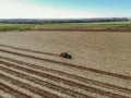 Fertilizing land where sugar cane was planted aerial view