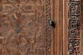 FES, MOROCCO - APRIL 01, 2023 - Traditional oriental facade at the courtyard of madrasa Bou Inaniya in the medina of Fes