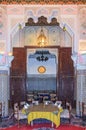 Moroccan restaurant decorated with mosaic and carvings in Fes