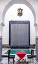 Courtyard decorated with mosaic and carvings in a Moroccan riad Royalty Free Stock Photo