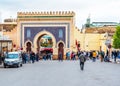 Fes, Morocco - November 12, 2019: Crowd of tourists near the gates of Bab Bou Jeloud gate The Blue Gate