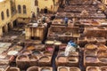 Men working in the leather tanneries in Fes, Morocco. Royalty Free Stock Photo