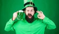 Fest and holiday menu. Dyed green traditional beer. Patricks day party. Alcohol beverage. Symbol of Ireland. Man bearded