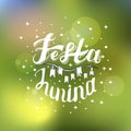 Festa Junina. Holiday card design for Brazilian June fest de Sao Joao on the blurred background. Lettering illustration.