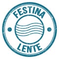 FESTINA LENTE text on blue round postal stamp sign