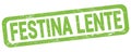 FESTINA LENTE text written on green rectangle stamp