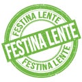 FESTINA LENTE text written on green round stamp sign