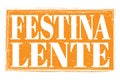 FESTINA LENTE, words on orange grungy stamp sign