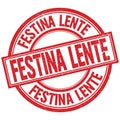 FESTINA LENTE written word on red stamp sign