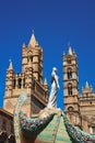 Palermo, Sicily - August 2012: Santa Rosalia processional float, the Santa Maria Assunta cathedral and a deep blue sky background Royalty Free Stock Photo