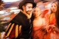 Festival goers in traditional costume dress