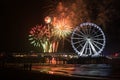 Moving Ferris Wheel and international fireworks competition at the beach in Scheveningen, the Netherlands Royalty Free Stock Photo