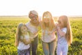 Festival of holi, people concept - Group of young people having fun outdoors Royalty Free Stock Photo