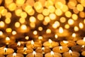 Diwali Festival of Lights. Beautiful candlelight. Selective focus on foreground of many burning tealight candles. Royalty Free Stock Photo