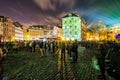 Festival of Lights in the city. People walking in the streets. Long exposure photography.