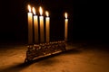 Festival of Lights, Hanukkah, chanukah, candles lit on a smooth marble stone
