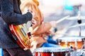 Festival music band. Friends playing on percussion instruments city park. Royalty Free Stock Photo