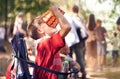 Festival, party and boy eating popcorn outdoor in summer at event for celebration or entertainment. Kids, food or snack Royalty Free Stock Photo