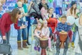 the festival of plasticine rain. a young man in ethnic clothes plays tomtom drums Royalty Free Stock Photo