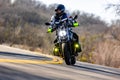 Festival security on a motorcycle during the Cedar Hill Race Festival