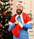 Festivals and presents concept. Man with beard in blue shirt Royalty Free Stock Photo